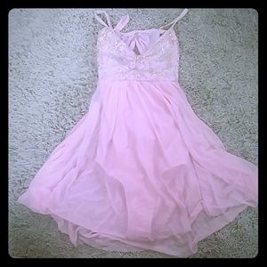 Contemporary pink dress with open back